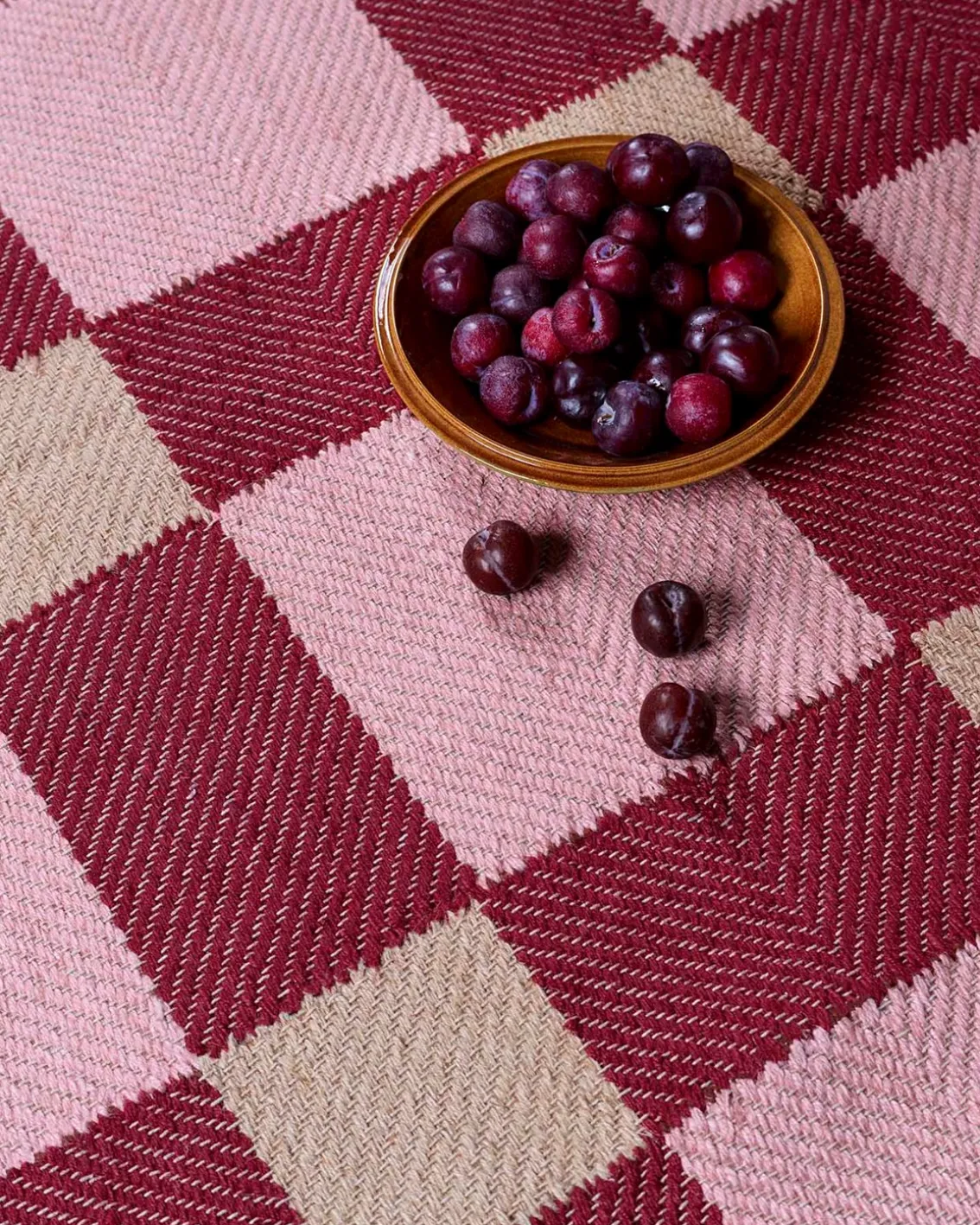 Layered Evelina Kroon Plum Punch Jute Rug